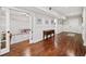 Finished basement with hardwood flooring, white trim, and an open playroom with plenty of natural light at 66 Mobile Ne Ave, Atlanta, GA 30305