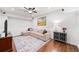 Finished basement with hardwood floors and seating area at 66 Mobile Ne Ave, Atlanta, GA 30305