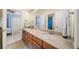Spacious bathroom with double sinks and granite countertops at 66 Mobile Ne Ave, Atlanta, GA 30305