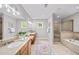 Luxurious bathroom with double vanity and separate shower and tub at 66 Mobile Ne Ave, Atlanta, GA 30305