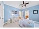 Bedroom features blue walls, and a view of the bathroom at 66 Mobile Ne Ave, Atlanta, GA 30305