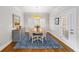 Dining room with hardwood floors, natural light, and elegant furnishings, perfect for hosting gatherings at 66 Mobile Ne Ave, Atlanta, GA 30305