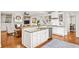 Modern kitchen with granite countertops, stainless steel appliances, and a breakfast bar with seating at 66 Mobile Ne Ave, Atlanta, GA 30305