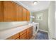 Laundry room with lots of cabinet space and washer/dryer at 66 Mobile Ne Ave, Atlanta, GA 30305