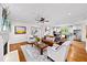Open-concept living room and kitchen with hardwood floors, ideal for modern living and entertaining at 66 Mobile Ne Ave, Atlanta, GA 30305