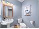 Stylish powder room with unique fixtures and decorative artwork at 66 Mobile Ne Ave, Atlanta, GA 30305
