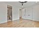 Bright bedroom with hardwood floors and a double door closet at 1240 Hayes Sq, Peachtree City, GA 30269
