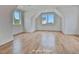 Bright bonus room with vaulted ceilings, hardwood floors, and plenty of natural light at 1240 Hayes Sq, Peachtree City, GA 30269