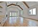 Bright living room with wood beams, fireplace, built-ins and access to the backyard at 1240 Hayes Sq, Peachtree City, GA 30269
