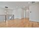 Second floor loft area with hardwood floors, modern chandelier, and natural light at 1240 Hayes Sq, Peachtree City, GA 30269