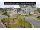 Street view of grey houses with front lawns and landscaping at 1240 Hayes Sq, Peachtree City, GA 30269