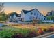 Street view of modern homes with well-manicured landscaping at 1240 Hayes Sq, Peachtree City, GA 30269