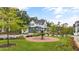Street view of a house in a suburban area with fountain at 1240 Hayes Sq, Peachtree City, GA 30269