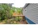 New home construction features a wood deck with stairs to the yard and gray siding at 1285 North Nw Ave, Atlanta, GA 30318