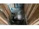 Unfinished basement with exposed framing, debris on the floor, and compromised flooring at 1285 North Nw Ave, Atlanta, GA 30318