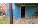 Exterior view of the blue foundation with an open basement entrance at 1285 North Nw Ave, Atlanta, GA 30318