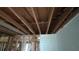 Renovation ceiling with exposed beams, next to a room with a more finished ceiling at 1285 North Nw Ave, Atlanta, GA 30318