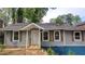 Inviting home exterior featuring a cozy front porch and light gray siding at 1285 North Nw Ave, Atlanta, GA 30318