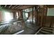 The home's interior is under construction, with exposed beams and stud walls at 1285 North Nw Ave, Atlanta, GA 30318