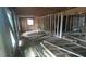 Renovation project showing a framed room with exposed studs and unfinished flooring at 1285 North Nw Ave, Atlanta, GA 30318