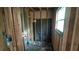 Unfinished interior showing wall framing, electrical boxes, and plumbing visible without drywall at 1285 North Nw Ave, Atlanta, GA 30318