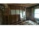 Remodeled interior with exposed framing reveals the potential of the home's layout at 1285 North Nw Ave, Atlanta, GA 30318