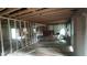 Unfinished room showing the open framework, ceiling beams, and stud walls at 1285 North Nw Ave, Atlanta, GA 30318