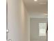 Inviting entryway features neutral walls, recessed lighting, and view of the stairway and living area at 504 Amethyst Way, Stockbridge, GA 30281