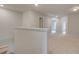 Upstairs hallway with carpet and access to multiple rooms at 504 Amethyst Way, Stockbridge, GA 30281