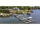 Scenic aerial view of the lake featuring waterfront homes with private boat docks for easy access to water activities at 3222 Bay View Dr, Jonesboro, GA 30236