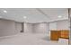 Finished basement area with tile flooring and a small kitchenette at 3222 Bay View Dr, Jonesboro, GA 30236
