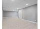 Basement featuring recessed lighting, tile flooring, and door at 3222 Bay View Dr, Jonesboro, GA 30236