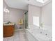 Bathroom with a soaking tub, shower, and modern vanity at 3222 Bay View Dr, Jonesboro, GA 30236