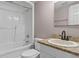 Clean bathroom featuring a shower, granite counter, and sink with modern fixtures at 3222 Bay View Dr, Jonesboro, GA 30236
