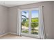 Bedroom view of lush landscaping from a large window at 3222 Bay View Dr, Jonesboro, GA 30236
