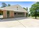 Spacious garage with brick accents offering ample parking and storage space at 3222 Bay View Dr, Jonesboro, GA 30236