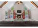 Bright living room with fireplace, tall windows, hardwood floors and views of the pool at 3222 Bay View Dr, Jonesboro, GA 30236