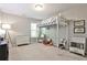 bedroom featuring neutral walls, white furniture, and a loft bed at 334 Pin Oak Ave, Woodstock, GA 30188
