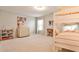 bedroom featuring neutral walls, white furniture, carpet flooring, and a bunk bed at 334 Pin Oak Ave, Woodstock, GA 30188