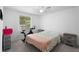 Light bedroom with neutral colors, a ceiling fan, closet, and workout equipment at 3512 Lynview W Ct, Decatur, GA 30034