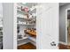 Well-organized pantry featuring ample shelving and storage for various food items at 4092 Grand Park Dr, Suwanee, GA 30024