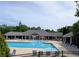 Enjoy the community pool with covered lounge area for relaxing at 4605 Fourth Rail Ln, Cumming, GA 30040