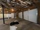 Spacious garage with white garage doors and room for multiple vehicles or storage at 554 Oak Landing Cir, Douglasville, GA 30134