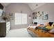 Cozy bedroom with sloped ceiling and window providing natural light at 6317 Benbrooke Overlook Nw, Acworth, GA 30101