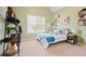 Bedroom with bright natural light, and decorated with posters and shelves at 6317 Benbrooke Overlook Nw, Acworth, GA 30101