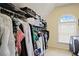 Walk-in closet with ample storage and natural light from a window at 6317 Benbrooke Overlook Nw, Acworth, GA 30101