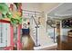 Inviting foyer with hardwood floors, a staircase with white railings, and a view into other living spaces at 6317 Benbrooke Overlook Nw, Acworth, GA 30101