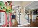 Elegant foyer showcasing hardwood floors, staircase with black and white banister, and open floor plan at 6317 Benbrooke Overlook Nw, Acworth, GA 30101