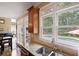 Bright and airy kitchen with a view of the pool and backyard through large windows at 6317 Benbrooke Overlook Nw, Acworth, GA 30101