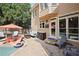 A well-appointed patio with comfortable seating, a grill, and a view of the refreshing pool at 6317 Benbrooke Overlook Nw, Acworth, GA 30101